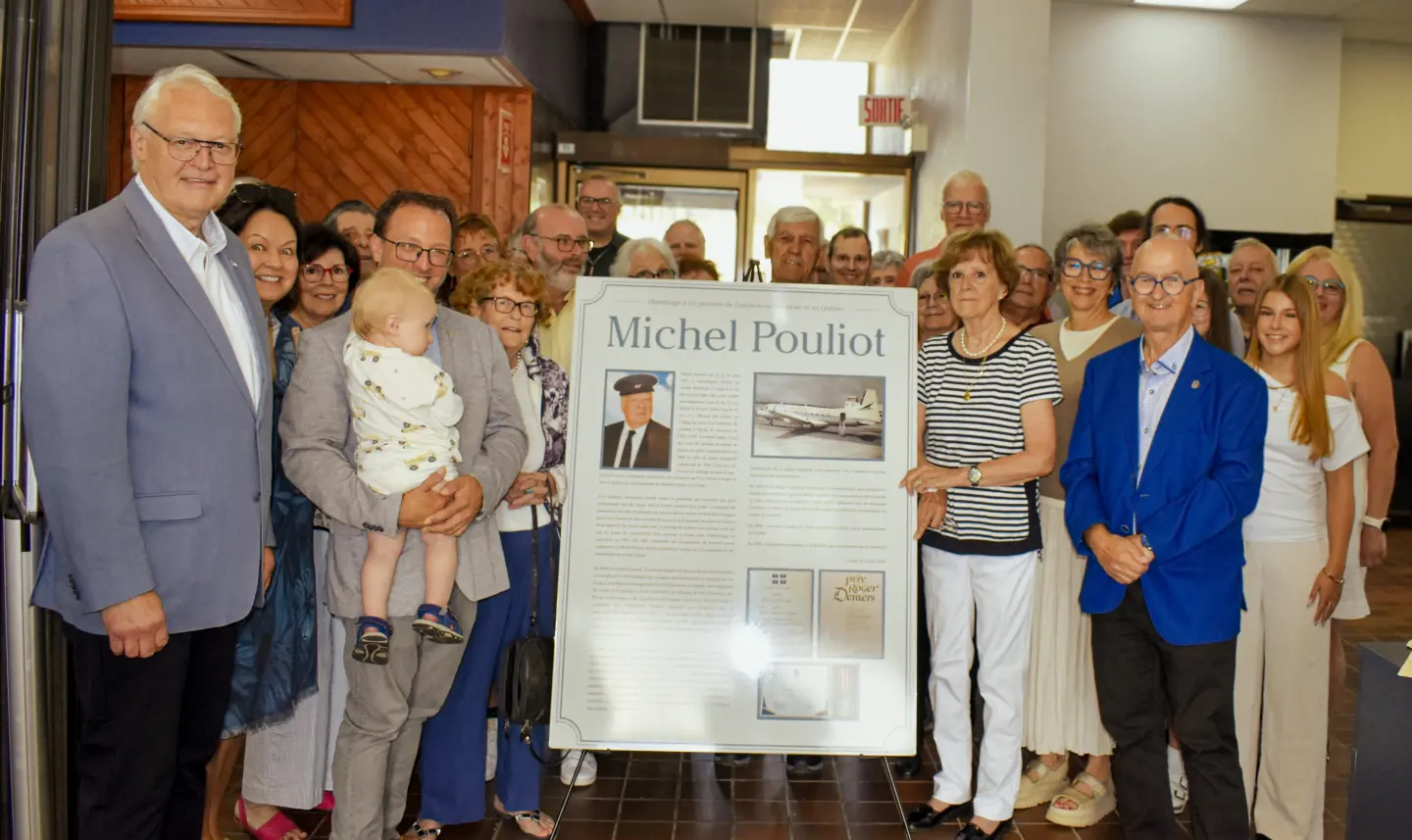 Group celebrating Michel Pouliot's legacy